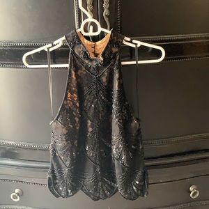 Gorgeous beaded black sleeveless top, sheer, lined